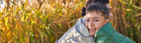 Photo for Happiness, love, african american boy in autumnal clothes hugging mother, autumn, fall, banner - Royalty Free Image