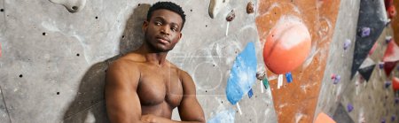 Photo for Handsome african american man with his arms crossed on chest posing with his shirt off, banner - Royalty Free Image