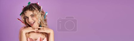 beautiful curly tooth fairy with toothbrushes in her hair smiling sincerely at camera, banner
