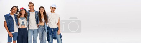 Photo for Group portrait of cheerful multiethnic friends in stylish trendy casual attire on grey, banner - Royalty Free Image
