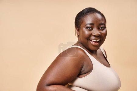 Photo for Happy african american plus size woman embracing self-love and confidence, body positive concept - Royalty Free Image