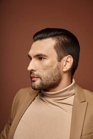 handsome man in elegant attire looking away on beige background, fashion-forward businessman Mouse Pad 692774084