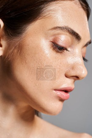 Photo for A young Caucasian woman with water drops on her face, exuding a sense of serenity and connection with nature. - Royalty Free Image