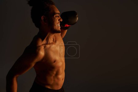 Photo for Jolly athletic african american man in sportwear with arms akimbo smiling joyfully at camera, banner - Royalty Free Image