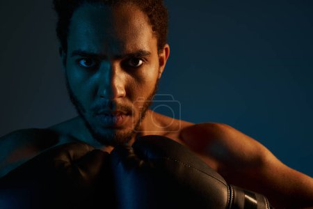 Photo for Jolly athletic african american man in sportwear with arms akimbo smiling joyfully at camera, banner - Royalty Free Image