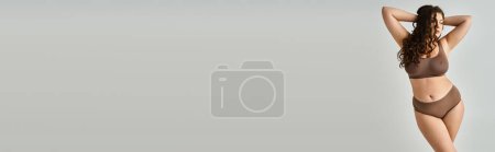 Photo for Banner of curvy girl in underwear putting hands on head and looking to down in grey background - Royalty Free Image