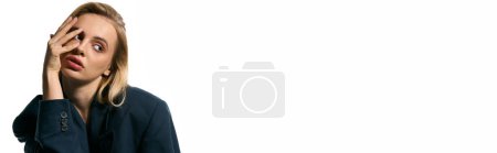 Photo for Appealing woman with blonde hair in chic blazer posing on white background and looking away, banner - Royalty Free Image