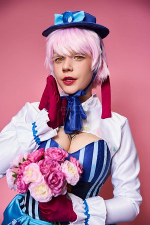 appealing cute female cosplayer in vibrant costume holding pink flowers and looking at camera puzzle 699818314