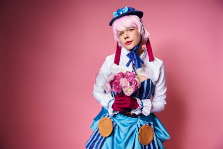 beautiful cute female cosplayer in vibrant costume holding pink flowers and looking at camera magic mug #699818392