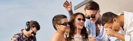 joyous interracial friends holding drinks and having fun next to DJ at rooftop party, banner