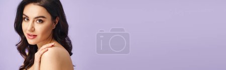 Photo for Woman striking a pose with hands on chest, exuding elegance and confidence. - Royalty Free Image