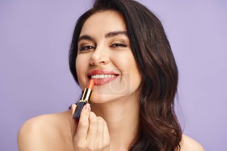Woman enhancing her natural beauty by applying lipstick.