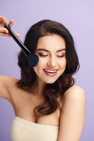 A charming woman creatively styling her face with a brush.