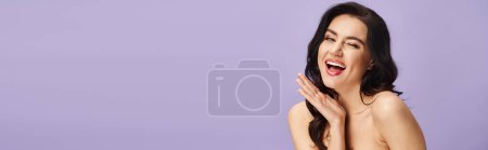 Photo for A stunning woman with a surprised expression while with makeup. - Royalty Free Image