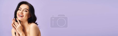 Photo for An attractive woman with natural beauty looks surprised. - Royalty Free Image