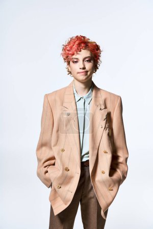 A striking woman with red hair donning a bold jacket and pants.