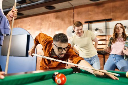Photo for Successful startup team enjoying a game of pool in a stylish office, bonding and strategizing during a break. - Royalty Free Image