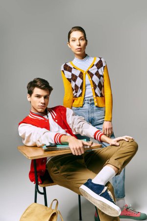 College students pose in classroom for fashion shoot.
