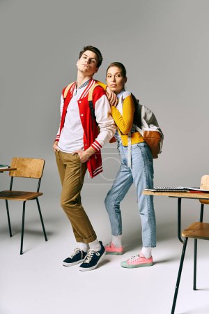 Stylish students pose in classroom setting, exuding casual charm.
