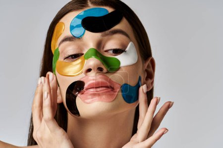 A beautiful young woman with eye patches on her face, showcasing artistic expression and creativity.