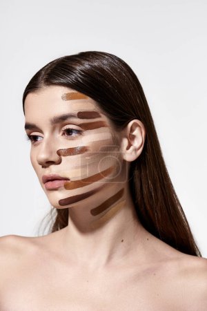 Téléchargez les photos : A beautiful young woman with makeup on her face, showcasing her enhanced beauty with foundation. - en image libre de droit