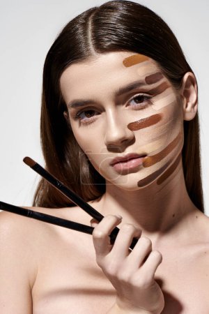 Sophisticated woman with various makeup brushes on her face, creating a creative and artistic look with foundation.