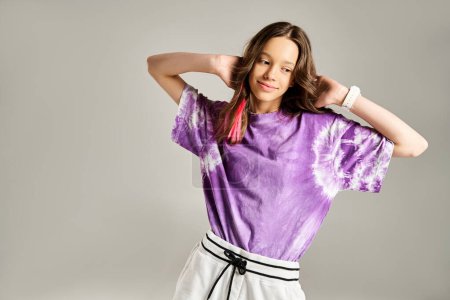 A fashionable teenage girl poses gracefully in a purple shirt and white skirt, exuding style and confidence.