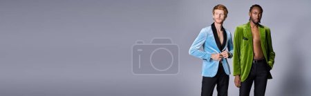Photo for Two handsome multicultural men in elegant dapper style posing together. - Royalty Free Image
