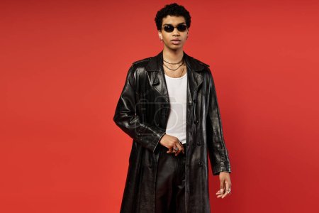 Photo for Handsome African American man in black trench coat and sunglasses. - Royalty Free Image