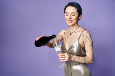 Young woman with short blue hair elegantly poses in a silver dress, holding a champagne glass.