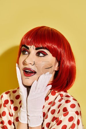 A vibrant redhead in a polka dot dress and white gloves exudes retro charm against a yellow background inspired by comic art.