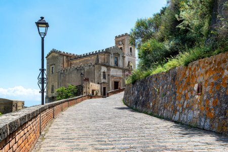 Photo for A view of the church S. Nicola of the village of Savoca, Sicily, Italy. The town was the location for the scenes set in Corleone of Francis Ford Coppola's The Godfather. - Royalty Free Image
