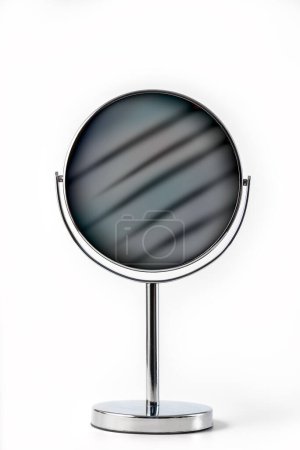 Photo for Silver makeup mirror isolated on white. Clipping path masking the mirror glass for easy image replacement - Royalty Free Image