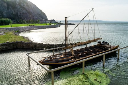 Replica of a medievel boat at The medieval fortress of Golubac. Famous tourist place, Serbia.
