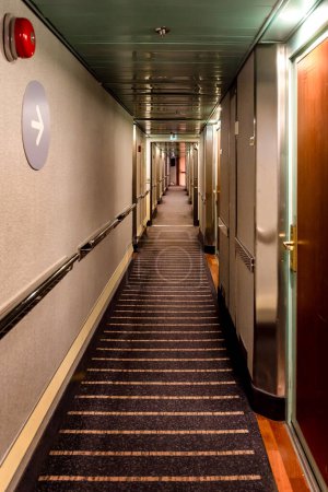 Cruise ship guest hallway or corridor with guests cabins on both sides