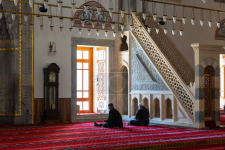 Photo for Islamic or ramadan concept photo. Muslim elder men praying in the mosque. Konya Sultan Selim Mosque. Konya Turkiye - 5.18.2022 - Royalty Free Image