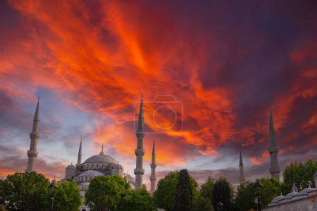 Sultanahmet Mosque or Blue Mosque with dramatic clouds at sunset. Ramadan or islamic concept photo.