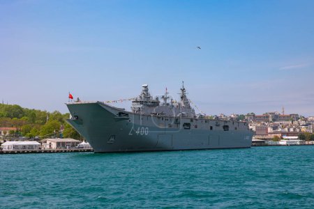 Photo for TCG Anadolu amphibious assault ship near the Sirkeci harbor. Istanbul Turkiye - 5.24.2023 - Royalty Free Image