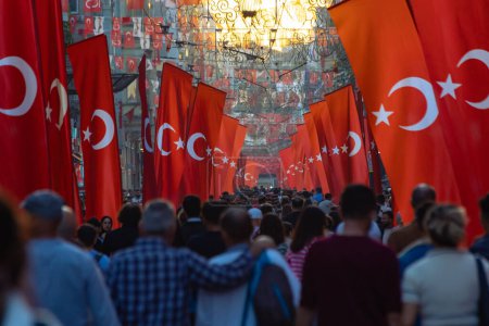 Photo for National holidays of Turkiye concept photo. Turkish people with Turkish flags in Istiklal Avenue. Istanbul turkiye - 10.28.2023 - Royalty Free Image