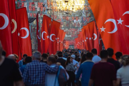 Photo for Turkish flags and Turkish people in the Istiklal Avenue. National holidays of Turkiye background photo. Istanbul Turkiye - 10.28.2023 - Royalty Free Image