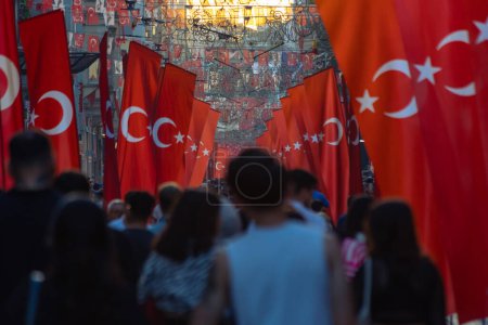 Photo for National holidays of Turkiye concept photo. Flags and Turkish people in Istiklal Avenue. Istanbul Turkiye - 10.28.2023 - Royalty Free Image