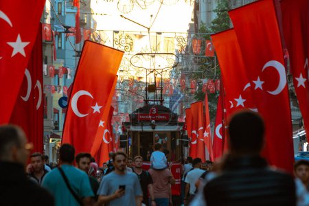 Photo for National holidays of Turkiye concept photo. People and Turkish flags in Istiklal Avenue. Istanbul Turkiye - 10.28.2023 - Royalty Free Image
