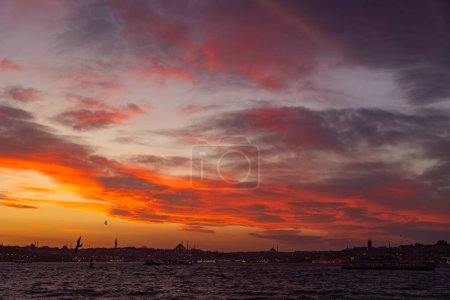 Silhoouette of Istanbul with dramatic clouds at sunset. Istanbul background photo.