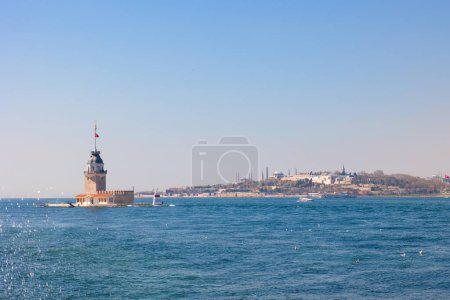 Kiz Kulesi or Maiden's Tower with cityscape of Istanbul at daytime. Visit Istanbul background photo.