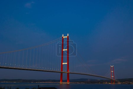 1915 Canakkale Bridge view at sunset. Turkish Economy or construction industry of Turkey concept photo. Noise included.