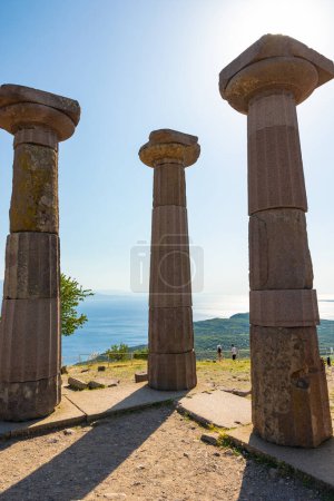 The Temple of Athena ruins in Assos Ancient City in Canakkale Turkiye. Visit Turkey concept vertical photo.