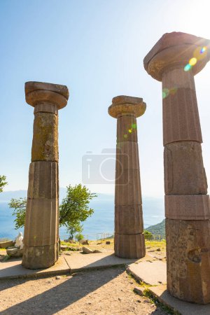 Temple of Athena in Assos ancient city in Canakkale Turkiye. Visit Turkey concept vertical photo.