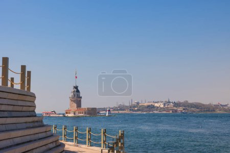 Kiz Kulesi or Maiden's Tower with cityscape of Istanbul. Visit Istanbul concept photo.