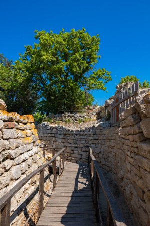 Ruins of Troy and wooden walkway. Visit Turkey concept photo. Troy ancient city in Canakkale Turkiye.