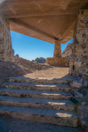 Photo for Camelback Mountain, Phoenix, Arizona- Shaded area on a hiking trail. Covered area with stairs and stone pillars against the view of the clear sky. - Royalty Free Image